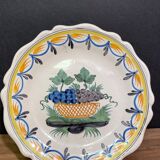 Faience dish of eighteenth-century style nevers decorated with basket with bunches of grapes