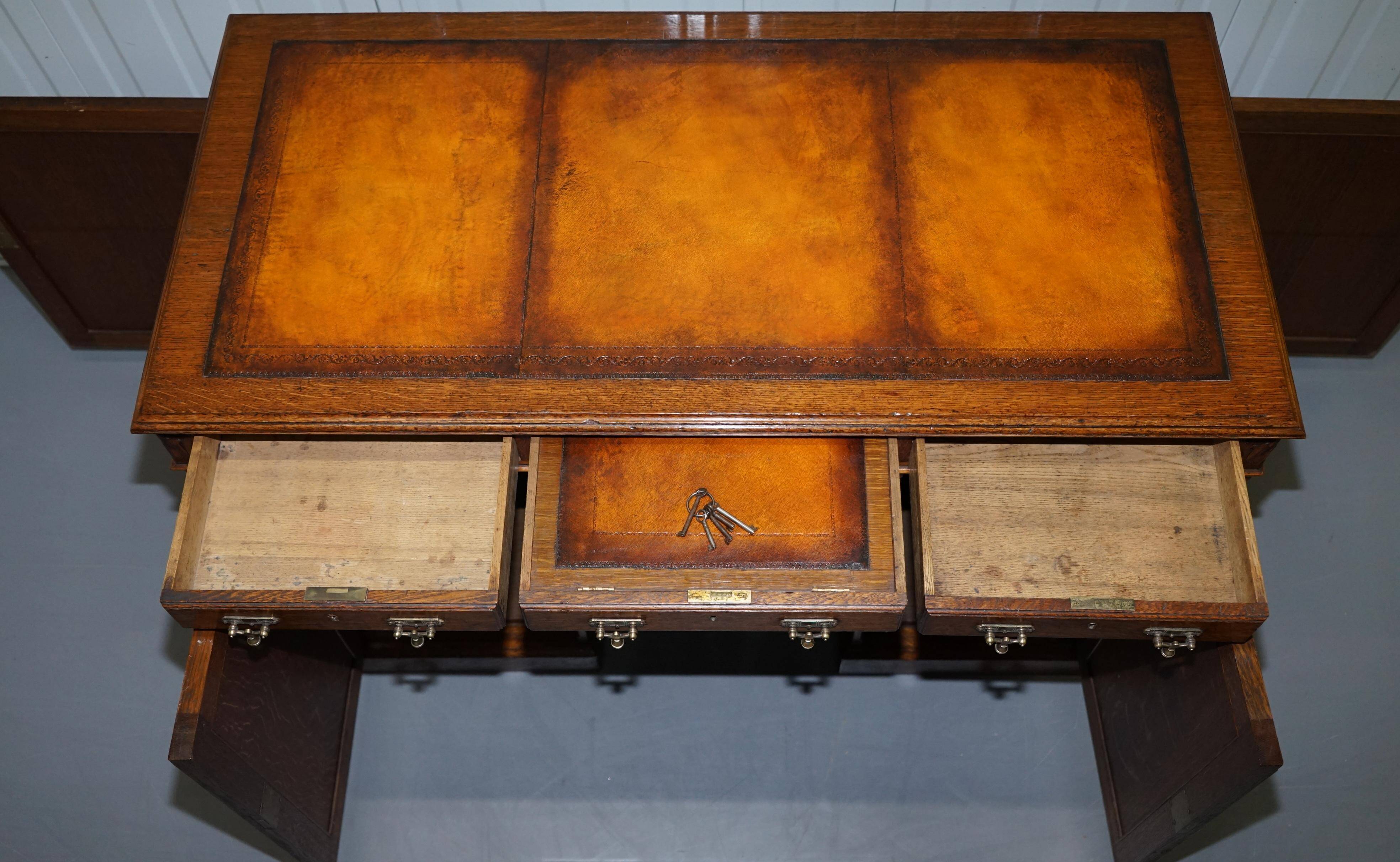Restored Gothic desk with side bookshelves, drawer, and sloping top by Pugin Gillows.