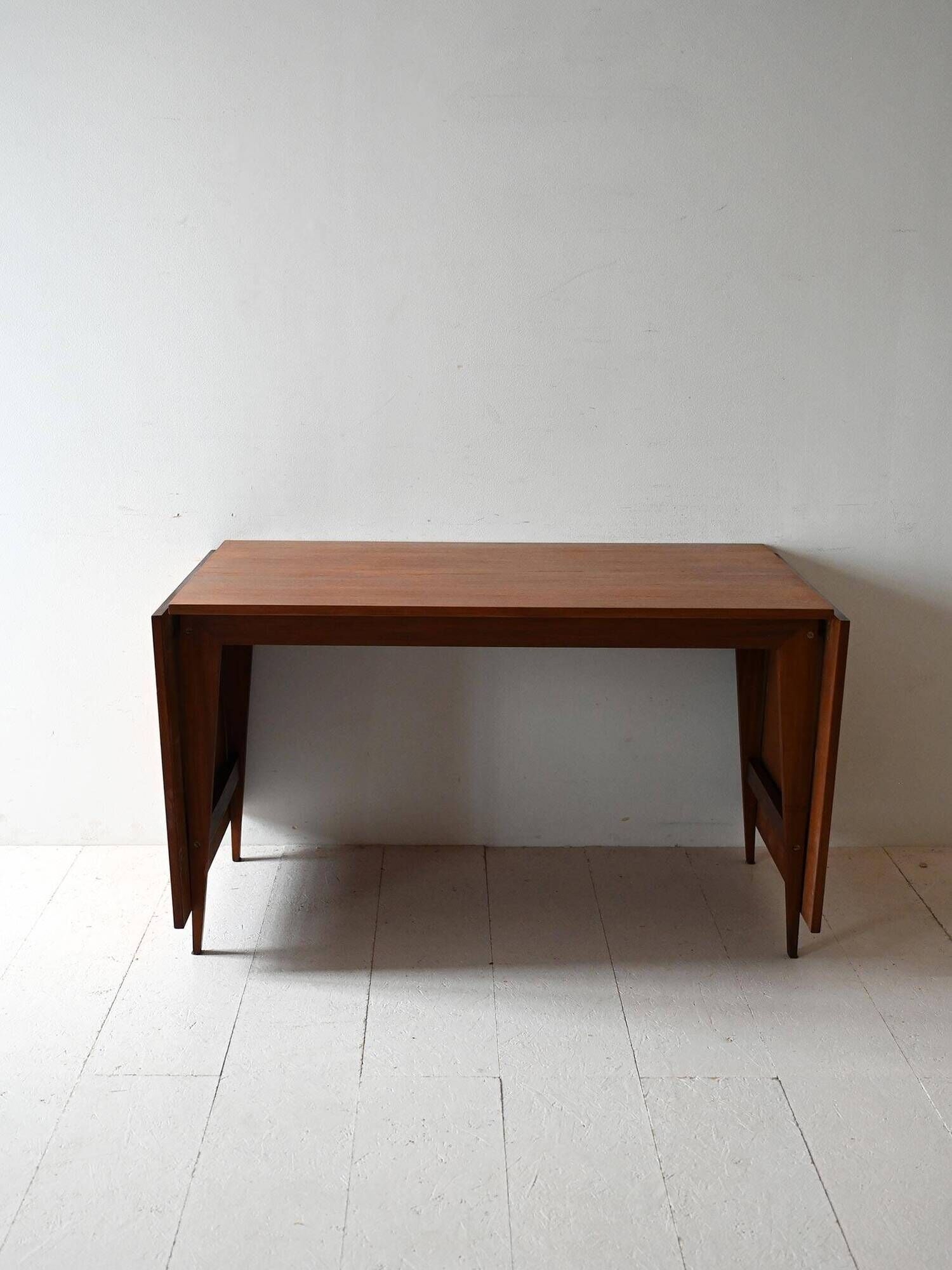 Vintage teak table by ISA Bergamo with drop-leaf extensions