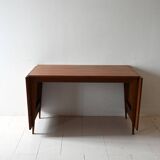 Vintage teak table by ISA Bergamo with drop-leaf extensions