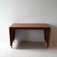 Vintage teak table by ISA Bergamo with drop-leaf extensions