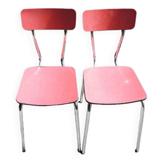 2 old red Formica chairs