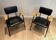Paire de fauteuils laqués noirs modèle "M" de Pierre Guariche, vers 1950