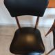 5 chairs in wood and black faux leather, Scandinavian style