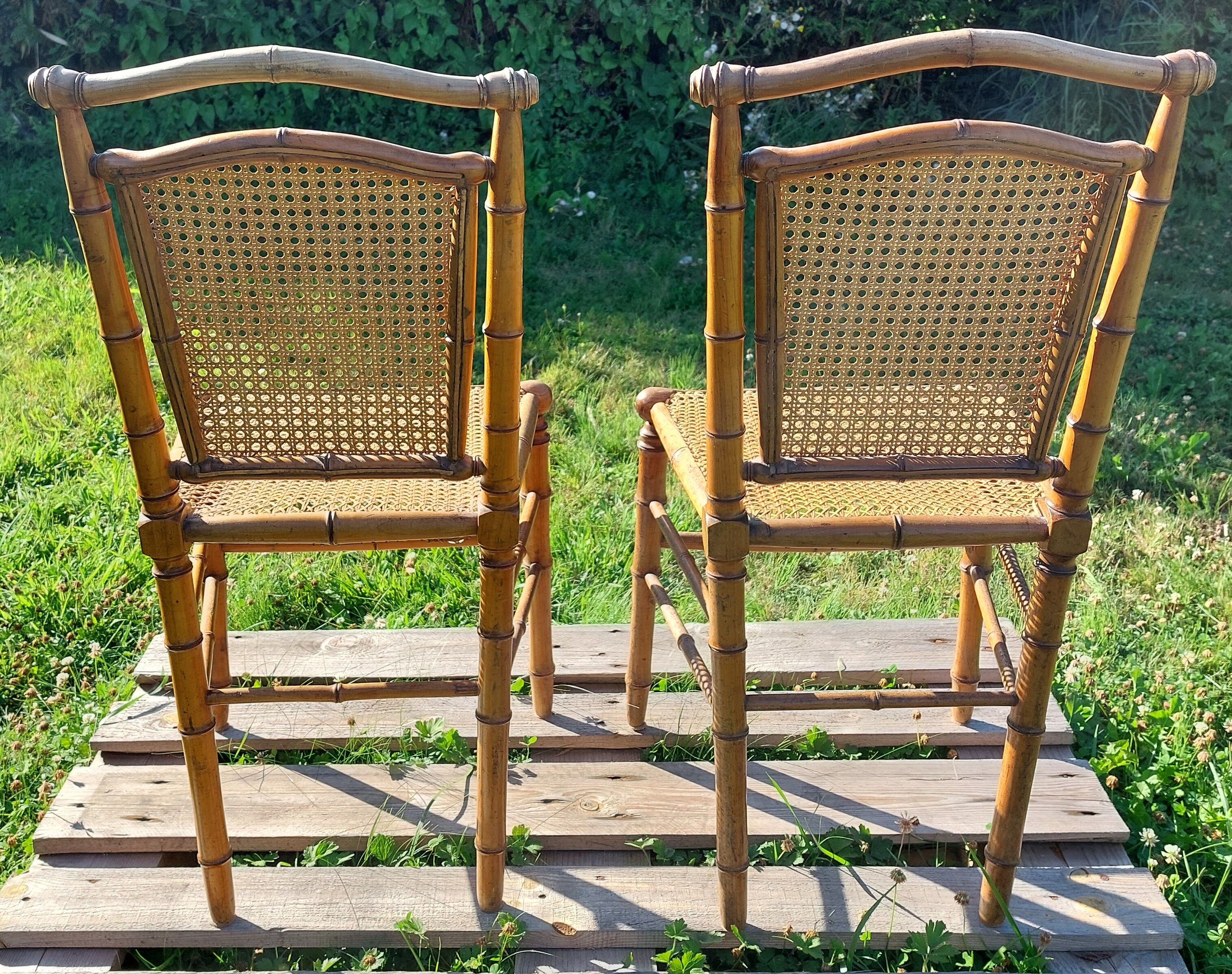 Duo of wooden chairs turned bamboo style