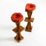 Two mid-century standing ashtrays consisting of red Alabaster cup