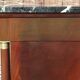 Flamed mahogany enfilade with sea green marble in Empire style.