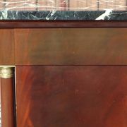 Flamed mahogany enfilade with sea green marble in Empire style.