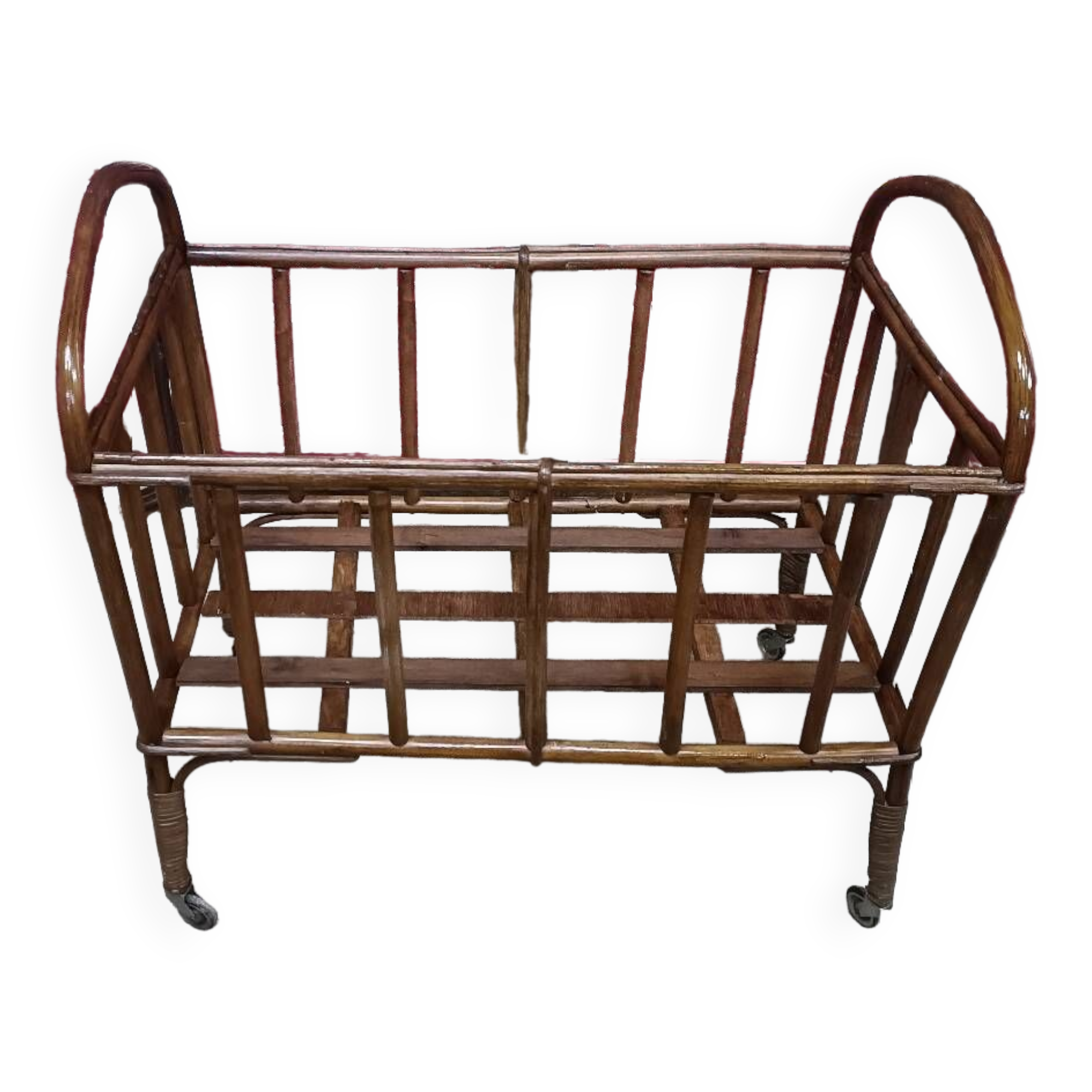 Old small bed or cradle for baby in vintage rattan