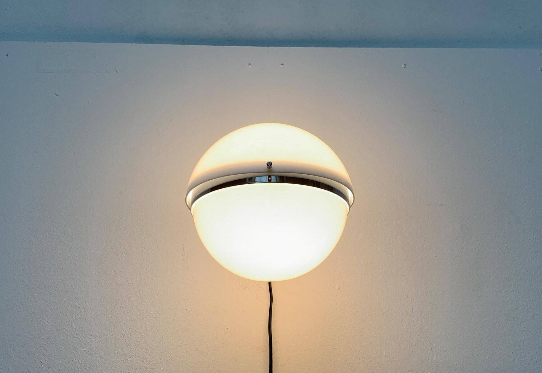 Mid-century Italian space age spherical wall light by Guzzini.