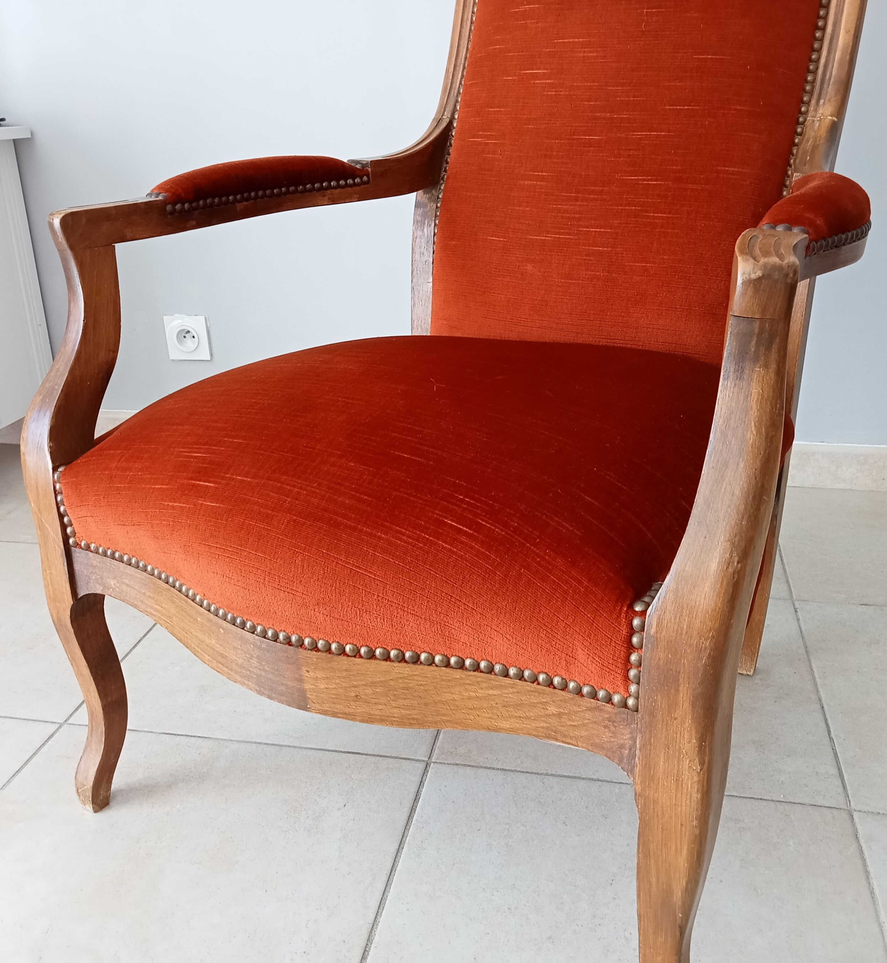 Walnut and velvet voltaire armchair