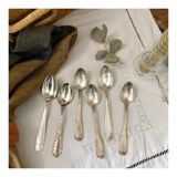 6 mismatched silver spoons