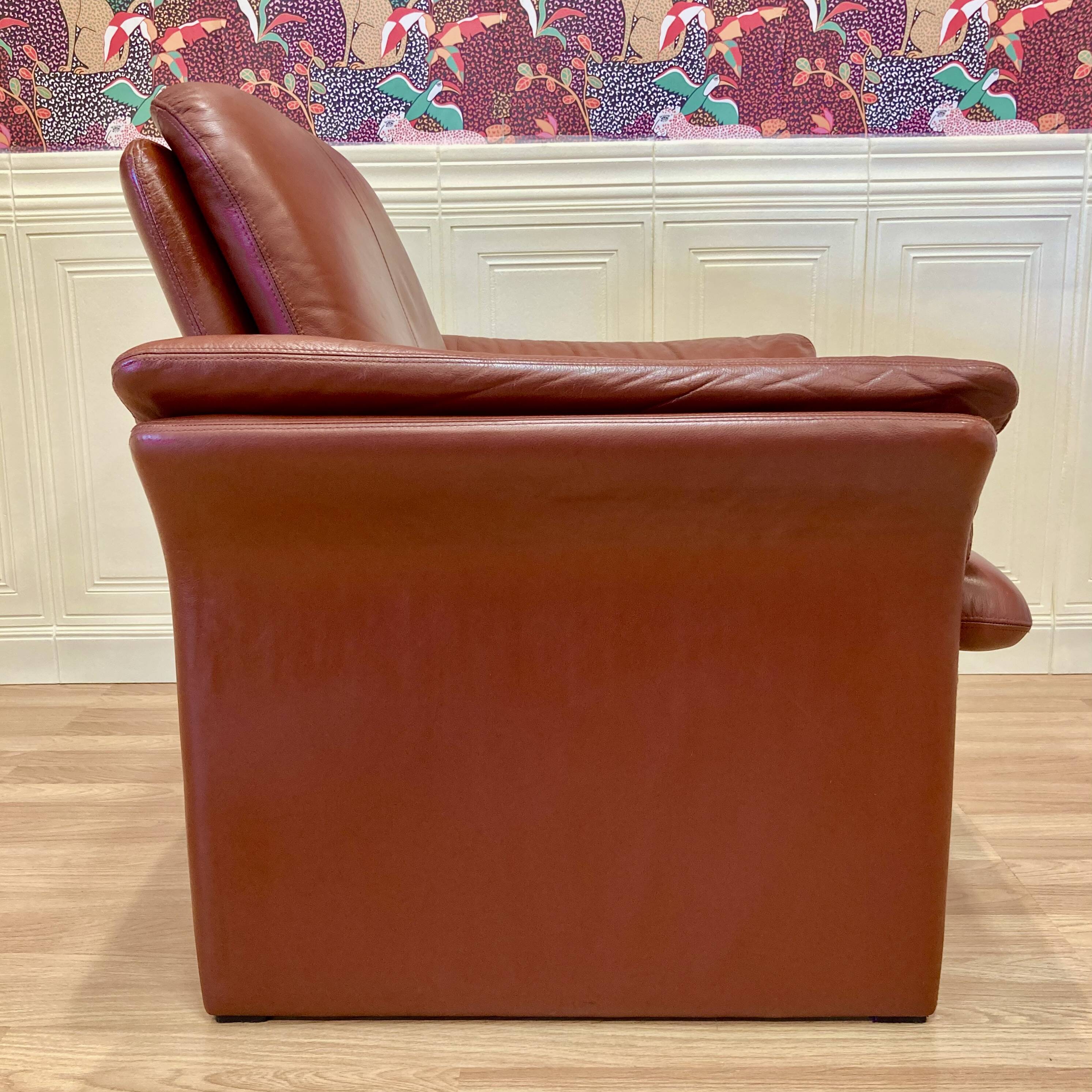 Pair of "Erpo" designer adjustable leather armchairs.