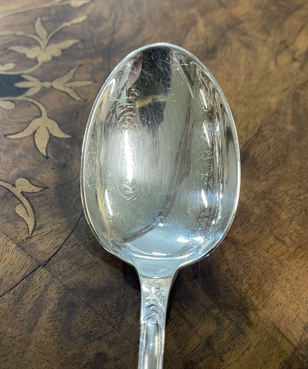 Series of 12 Christofle model Marly dessert spoons in silver metal