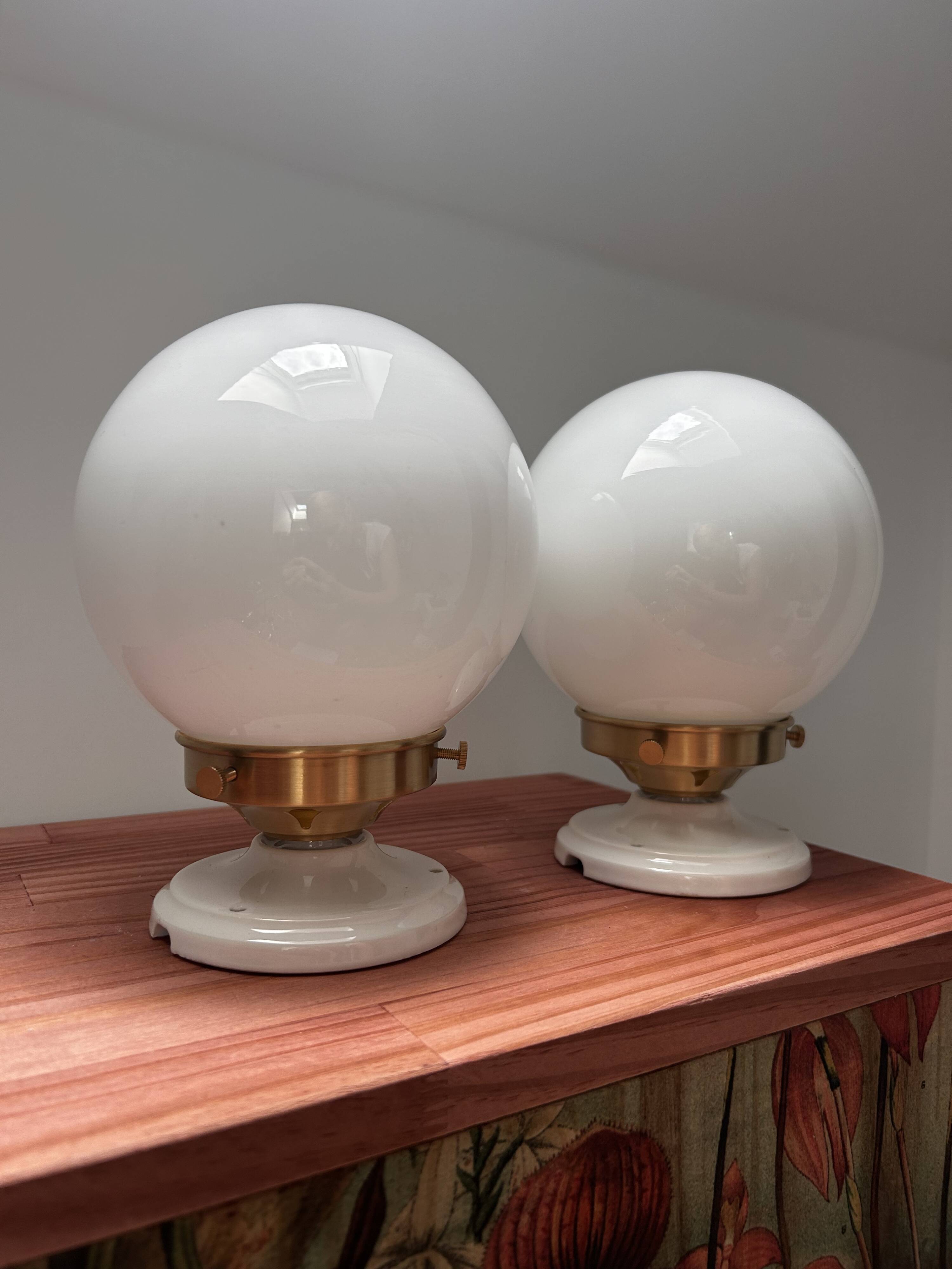 Set of two white opaline ball wall lights