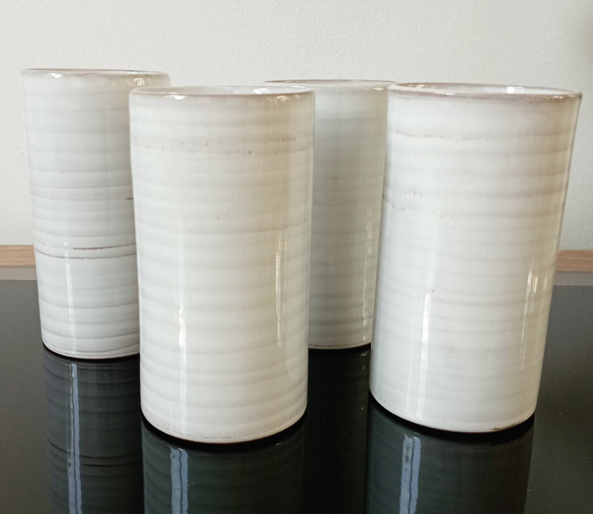 4 vintage stoneware cups in white