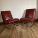 Paire de fauteuils vintage rouge bordeaux