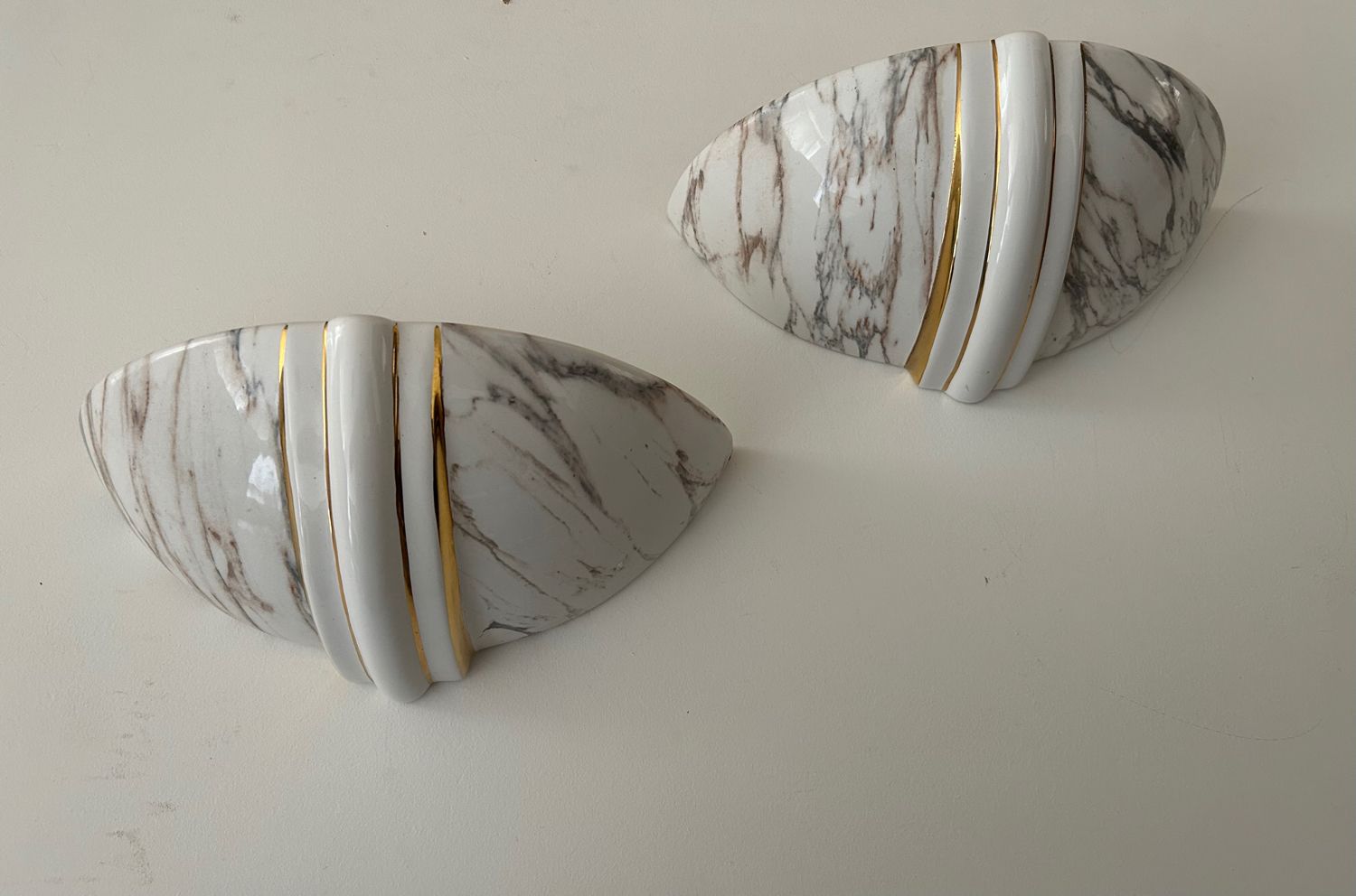 Pair of vintage marbled and gilded porcelain sconces, France 1970