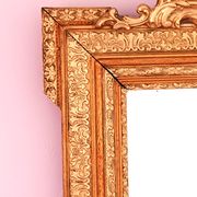 Napoleon III mirror with rich gilded ornamentation