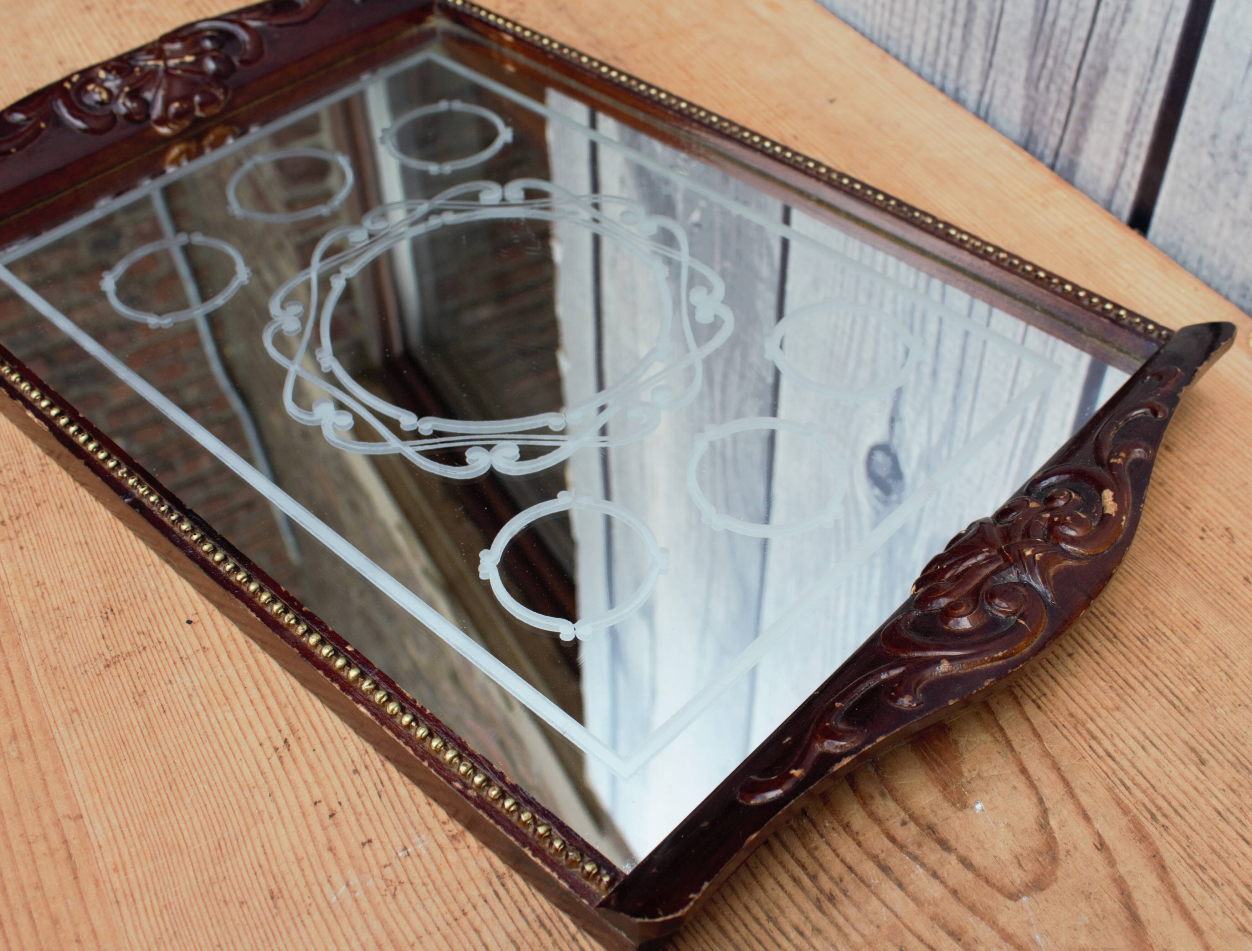 Old wooden tray with sandblasted mirror