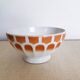 Large old bowl with piedouche in ochre yellow earthenware