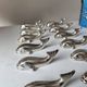 12 silver metal whale knife rests