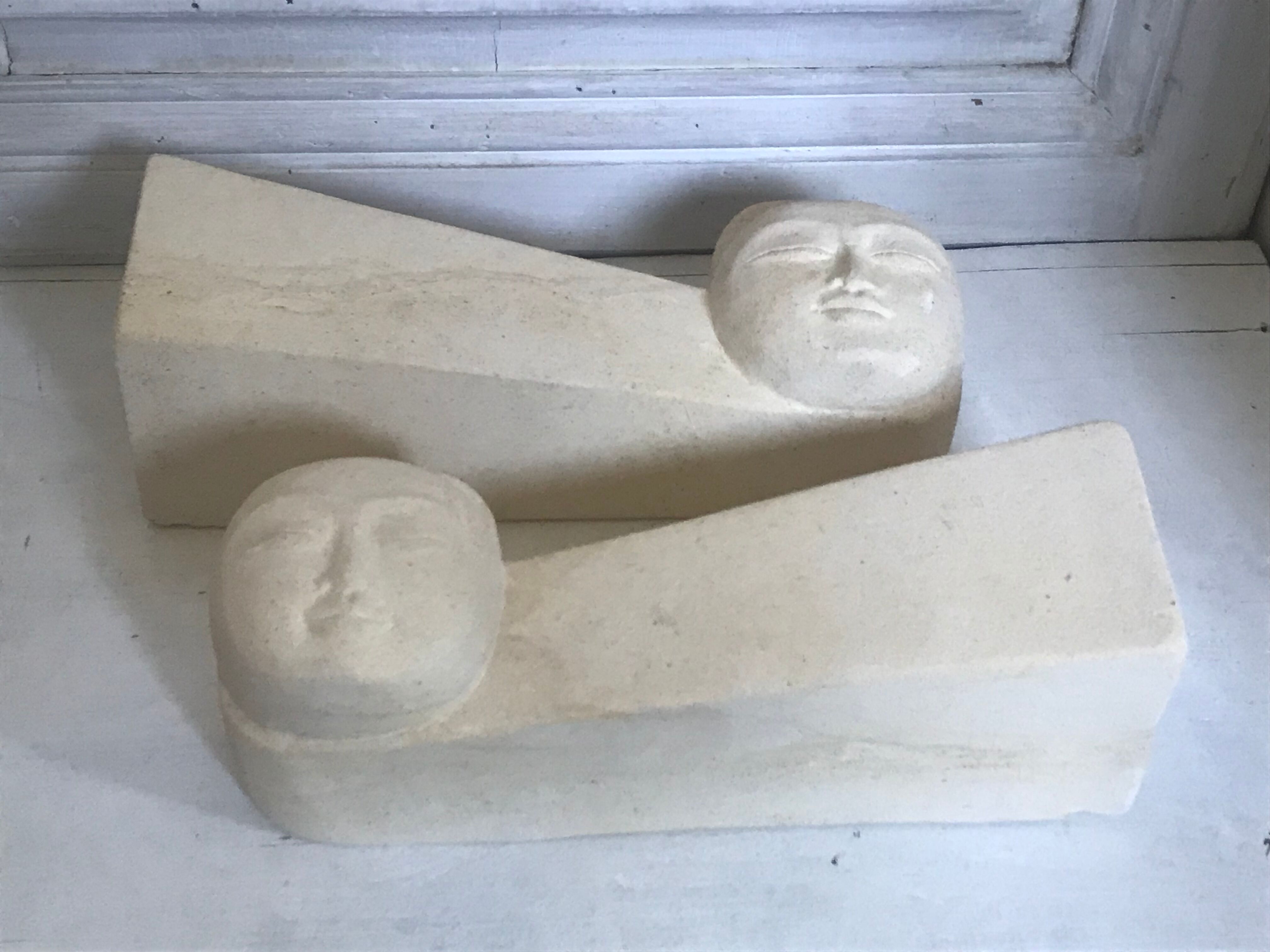 Pair of stone book clamts