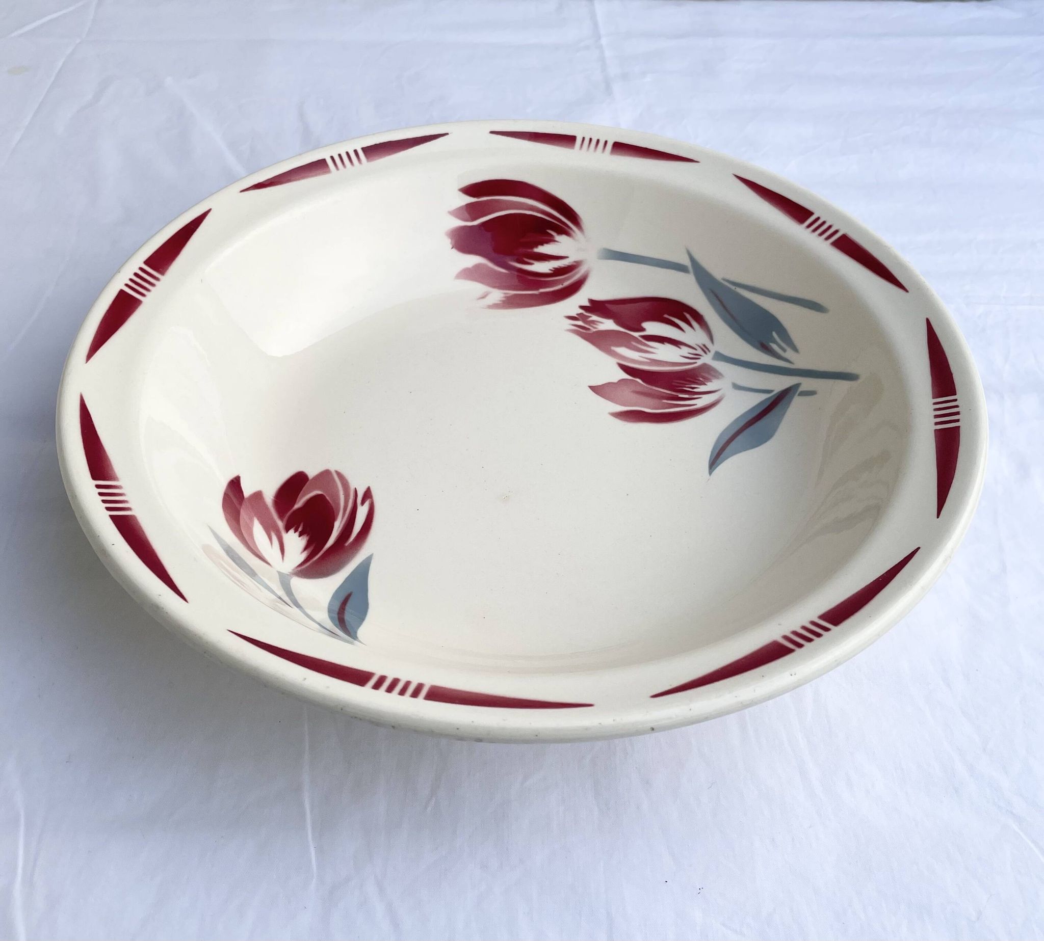 Plat creux ancien Badonviller décor tulipes