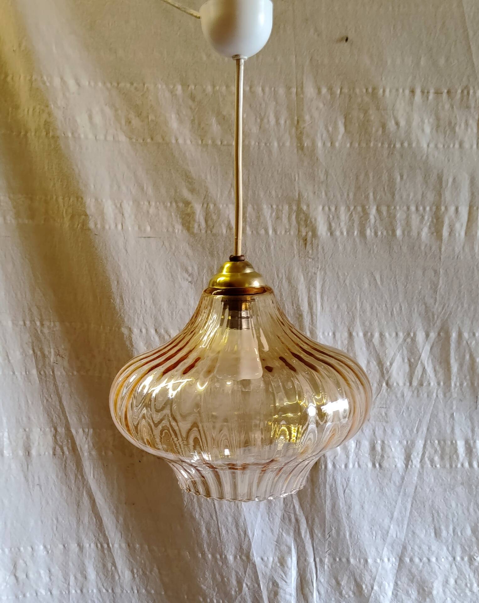 70's amber glass suspension design