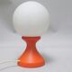 Small 1970s orange tulip-shaped ball lamp on a stand