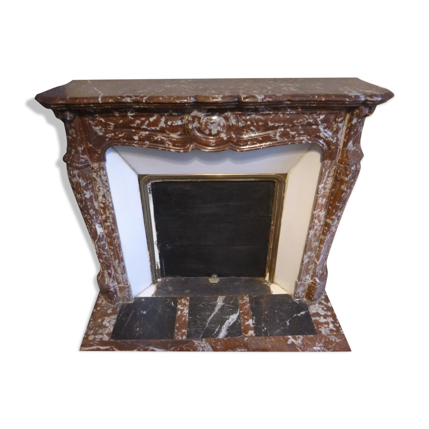 Red marble fireplace