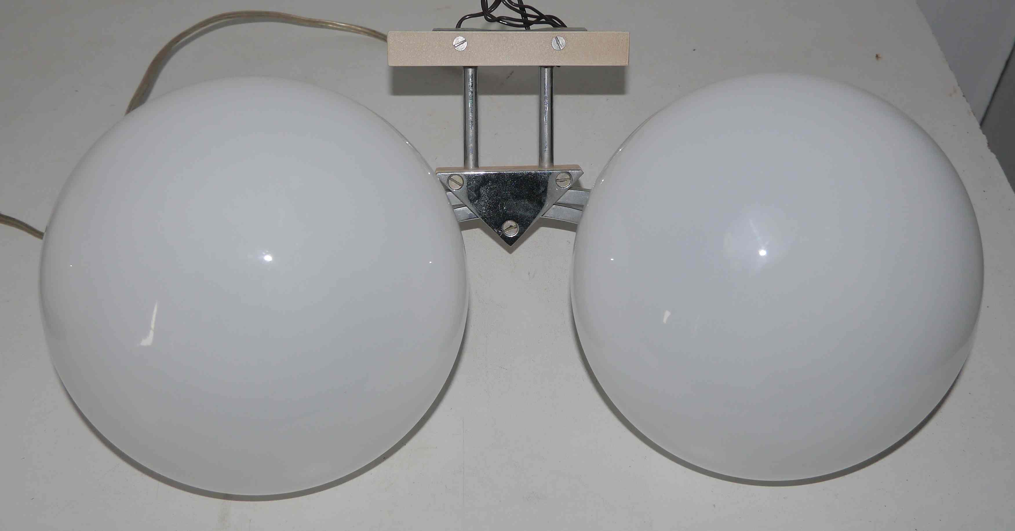 Pair of 60s wall lights in metal and opaline