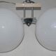 Pair of 60s wall lights in metal and opaline
