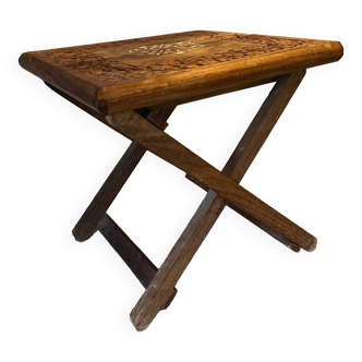 Carved wooden stool