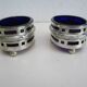 Silver metal and cobalt glass salt pots - EP St & co