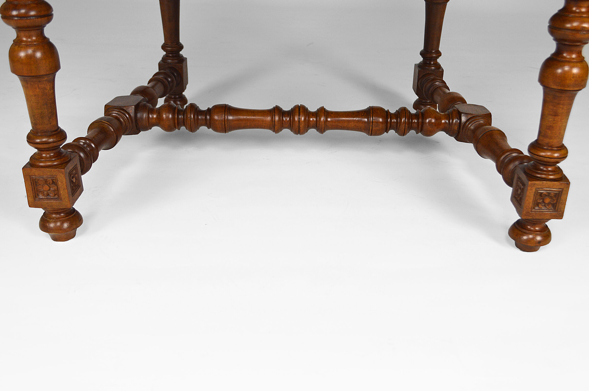 Louis XIII office armchair in leather and walnut carved around 1860