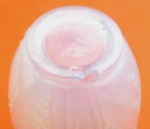 Opalescent glass vase in the shape of an urn Decoration of foliage and berries