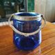 Old ice or biscuit bucket made of golden decor blue glass