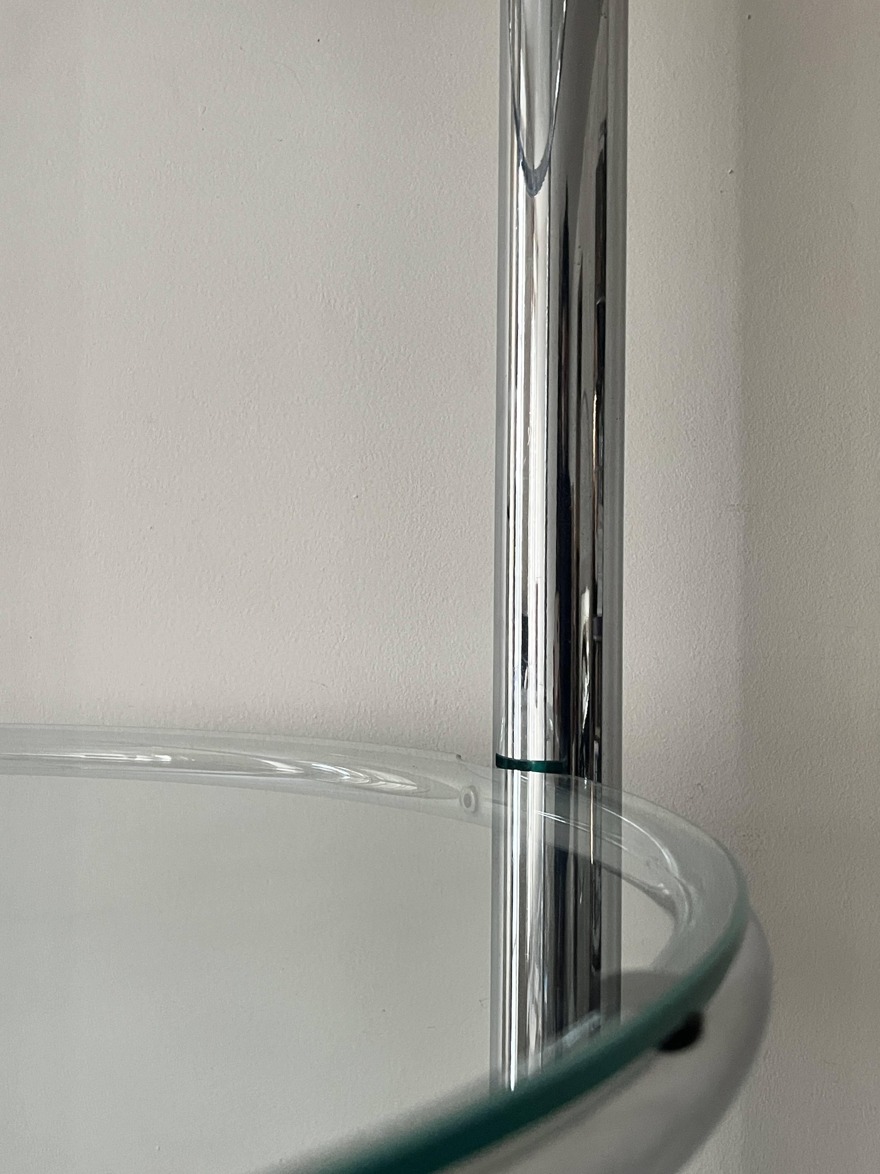 Round tubular bookcase in chrome and glass, 1970 design