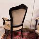 Paire de fauteuils style Louis XV en bois noirci, vers 1850