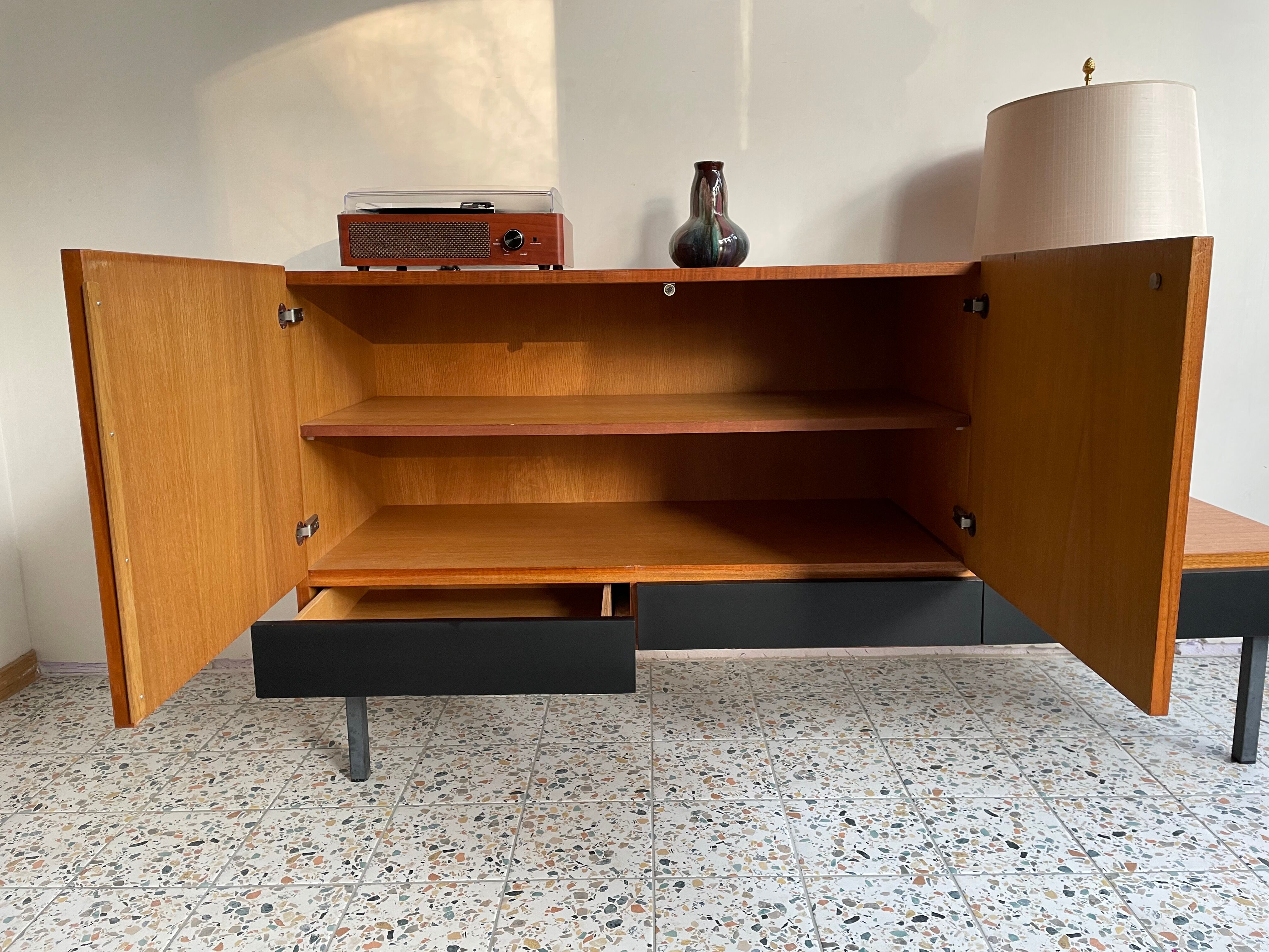 Asymmetrical vintage teak row
