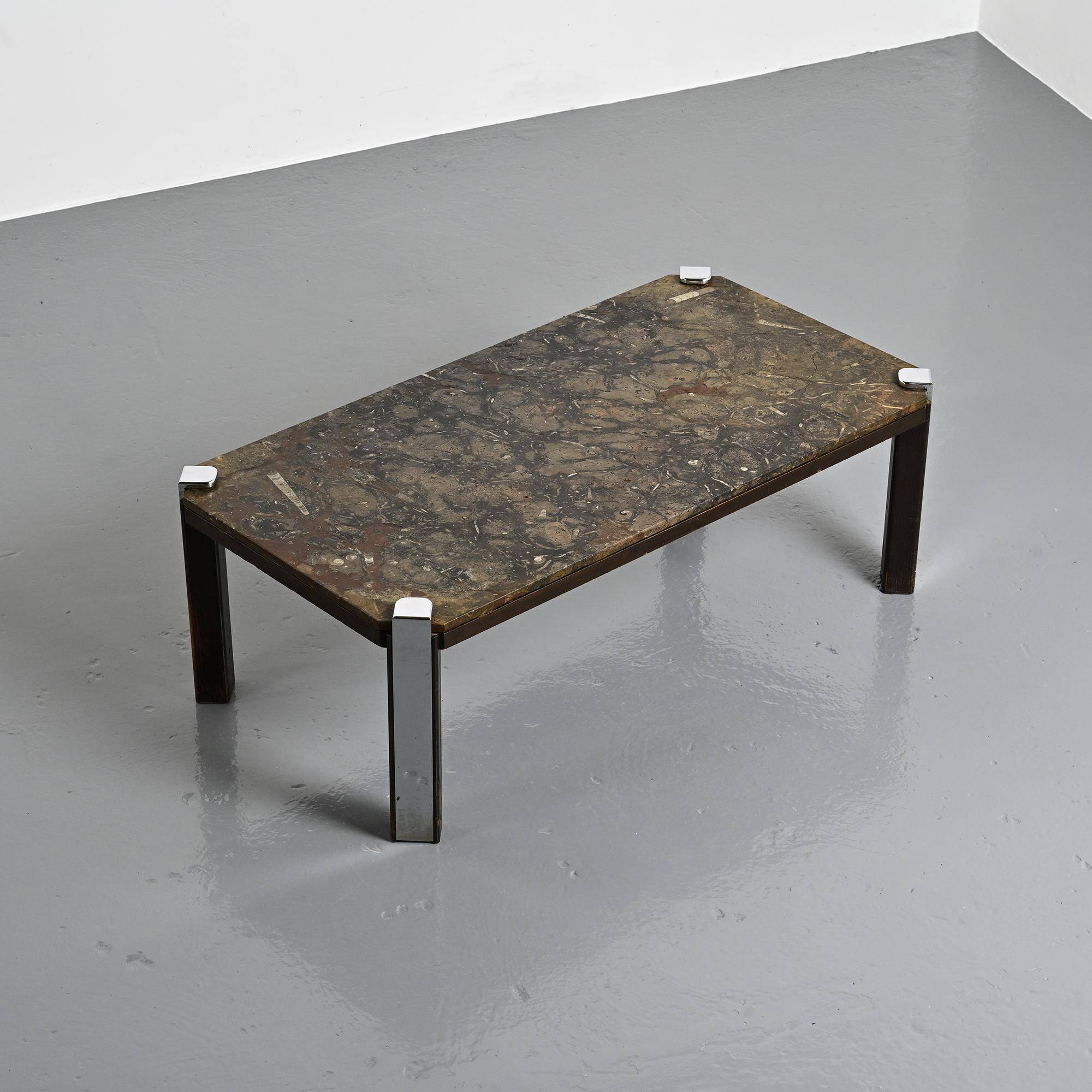 Fossil stone and chrome metal coffee table, Fossile Collection, Switzerland, circa 1980.