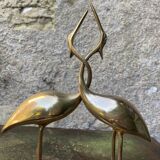 Couple of brass herons