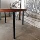 Round coffee table in walnut veneer and metal