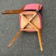 2 Scandinavian chairs in solid wood and burgundy leather from the 1970s.