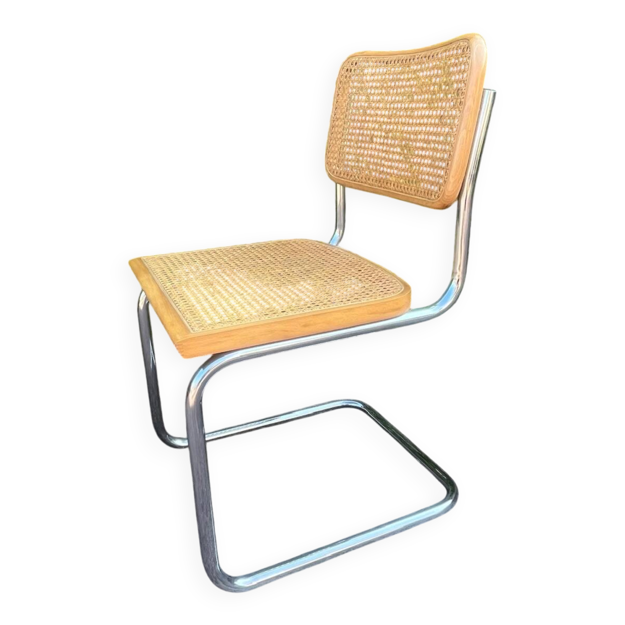 Wooden chair with caning in the style of Marcel Breuer.