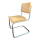 Wooden chair with caning in the style of Marcel Breuer.
