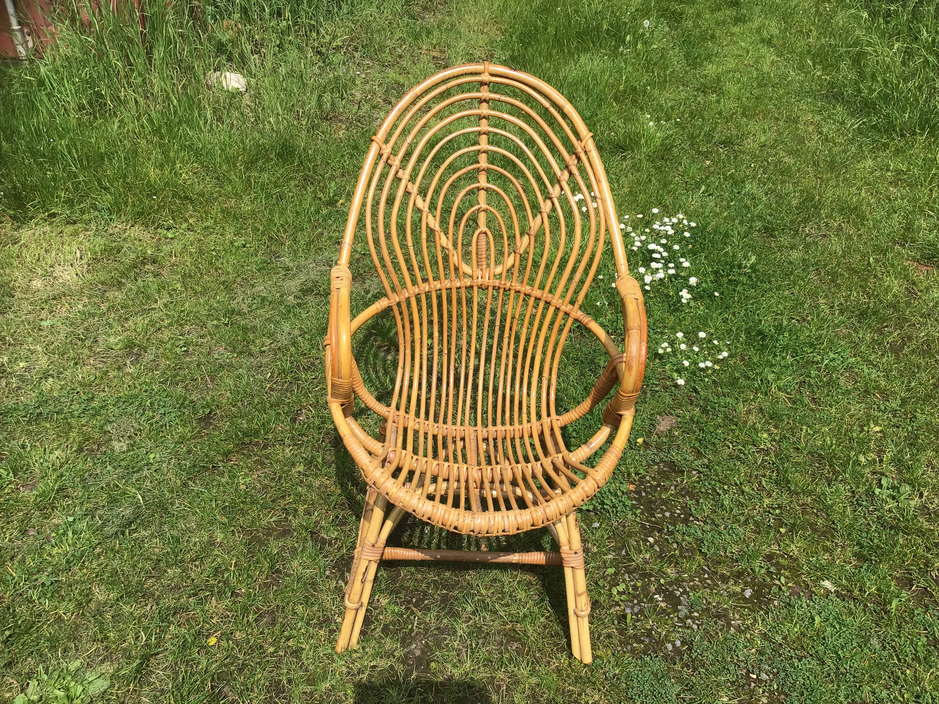 Vintage ovoid-shaped rattan armchair.