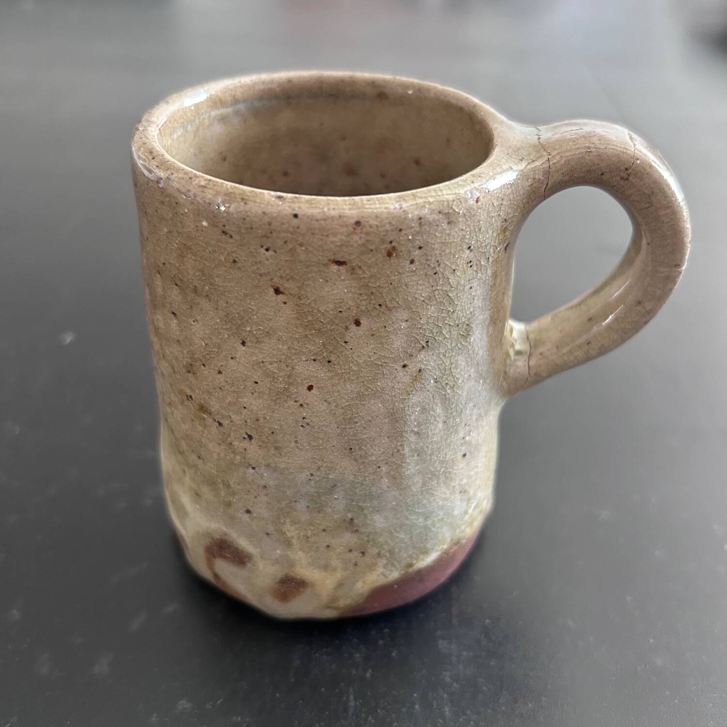Pair of signed stoneware mugs