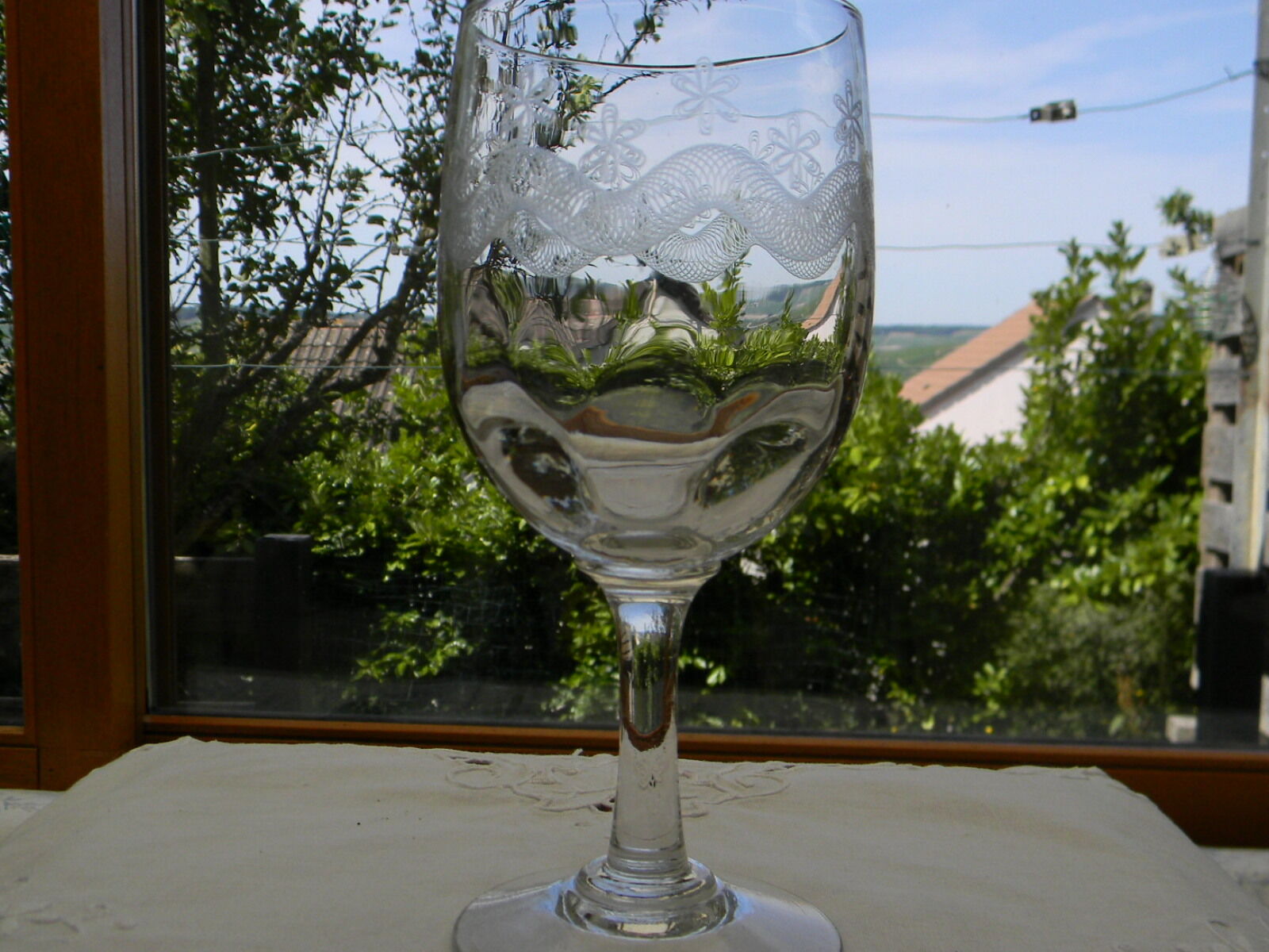 Set of 3 antique water glasses in engraved glass.